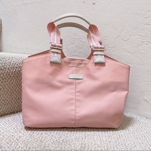 Agnes B. Voyage small pink handbag